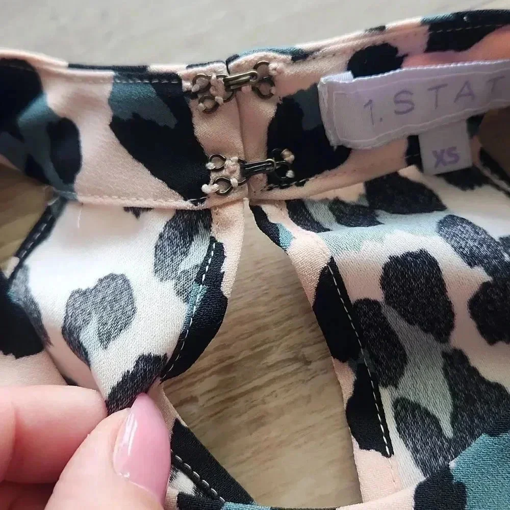 1. State Animal Print High Neck Swing Tank - Picture 6 of 6